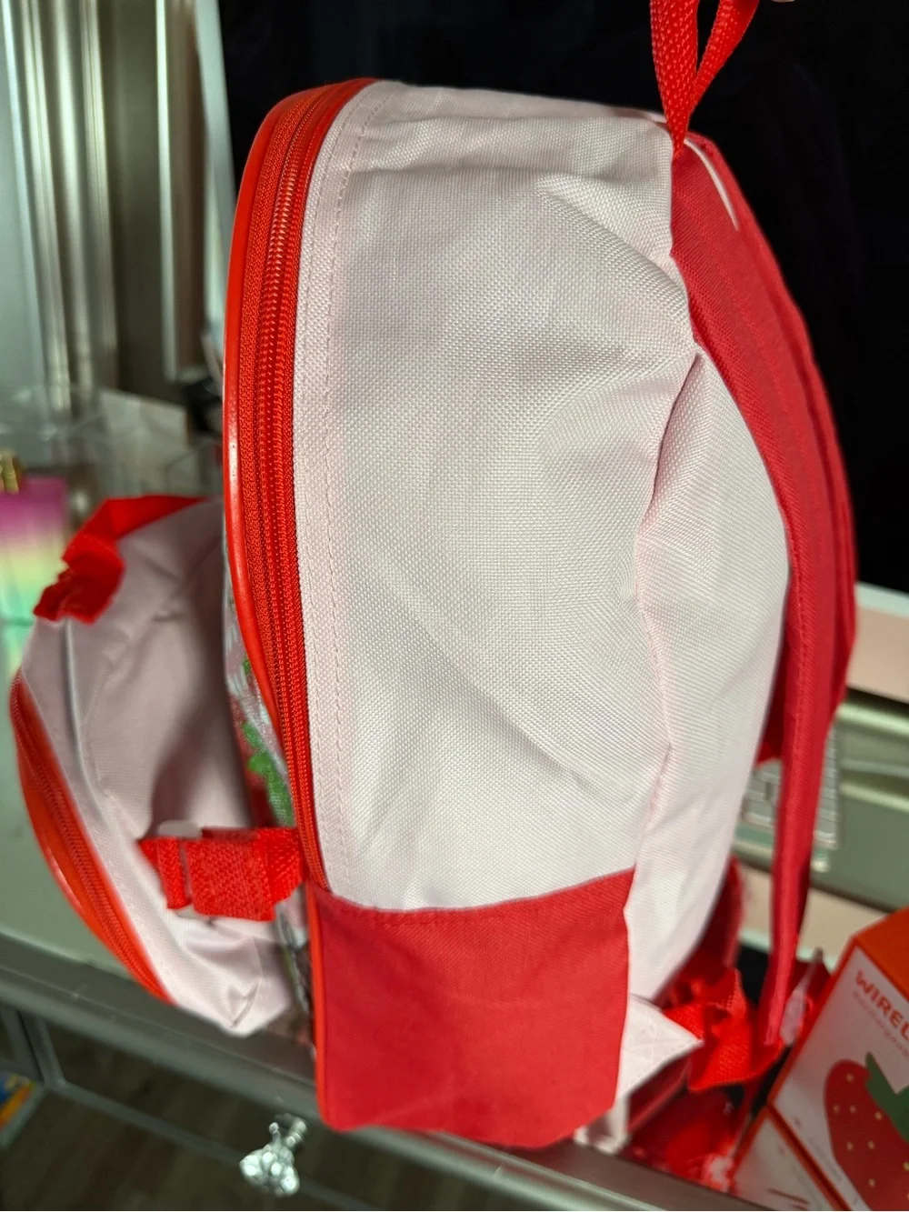 Pink Strawberry Kids Backpack with Lunchbox and a strawberry wireless speaker